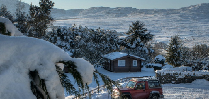 The cabins in Winter with a view across to the Rhinog mountains