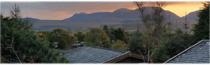 mountain view and sunset from Snowdonia log cabin accommodation