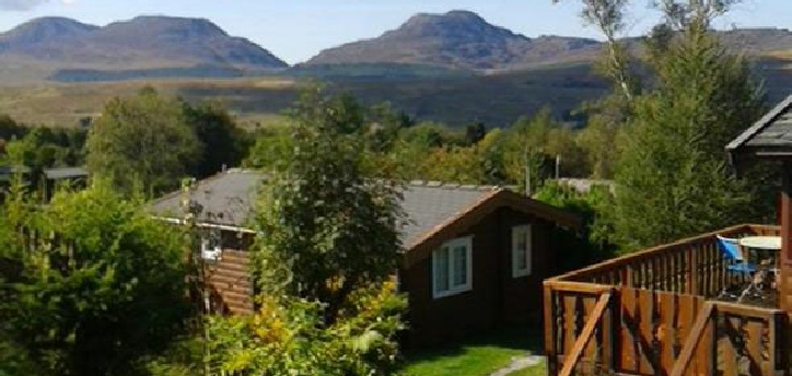 A view from one of our log cabin decks across to the Rhinog mountains