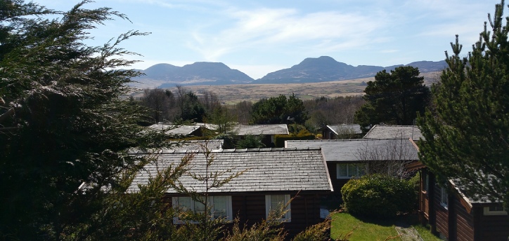 Stand and stare from one of our log cabin decks - the view of the Rhinogydd mountains changes constantly